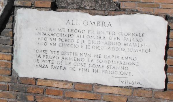 La targa in piazza Trilussa a Trastevere, ‎tra lungotevere Raffaello Sanzio e via di Ponte Sisto